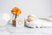 Load image into Gallery viewer, Envy's Comfort CBD Bath Bomb provides an aromatic blend of orange and lemon. With its antibacterial, antiviral, and immuno-stimulant properties, this combination of essential oils is a natural analgesic that helps to detox the body. Every Bath Bomb contai