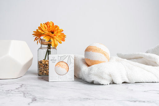 Envy's Comfort CBD Bath Bomb provides an aromatic blend of orange and lemon. With its antibacterial, antiviral, and immuno-stimulant properties, this combination of essential oils is a natural analgesic that helps to detox the body. Every Bath Bomb contai